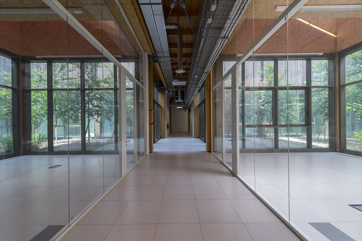 Mario Cucinella Architects designs ARPAE headquarters with chimney-shaped roofs in Ferrara, Italy