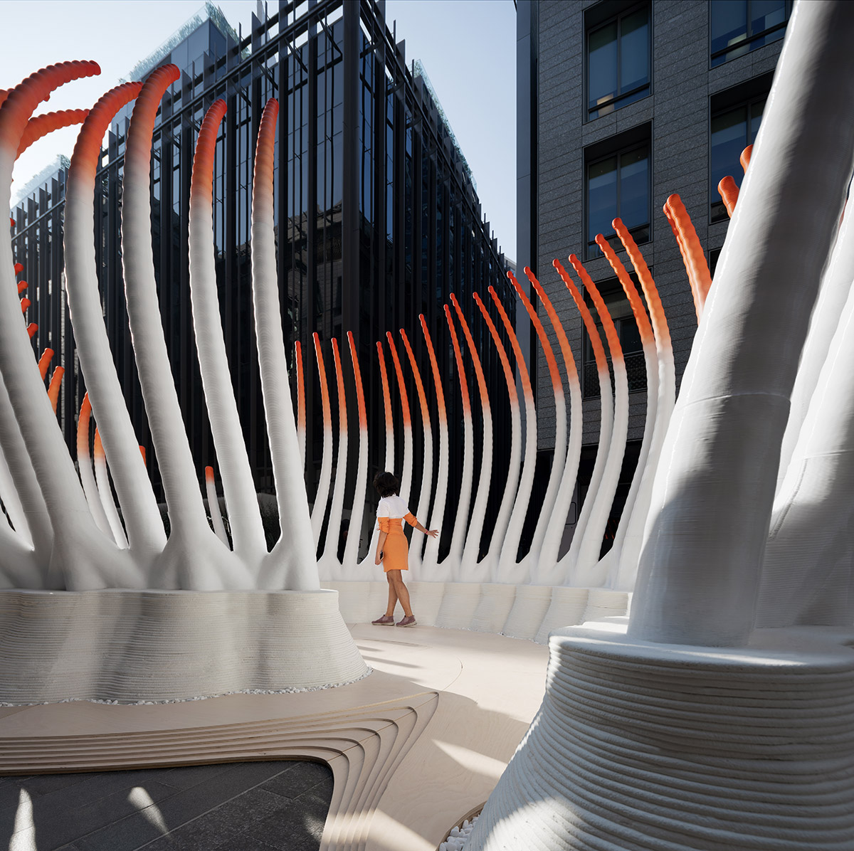 MEAN* used 30,000 discarded water bottles to create this geared pavilion in Dubai