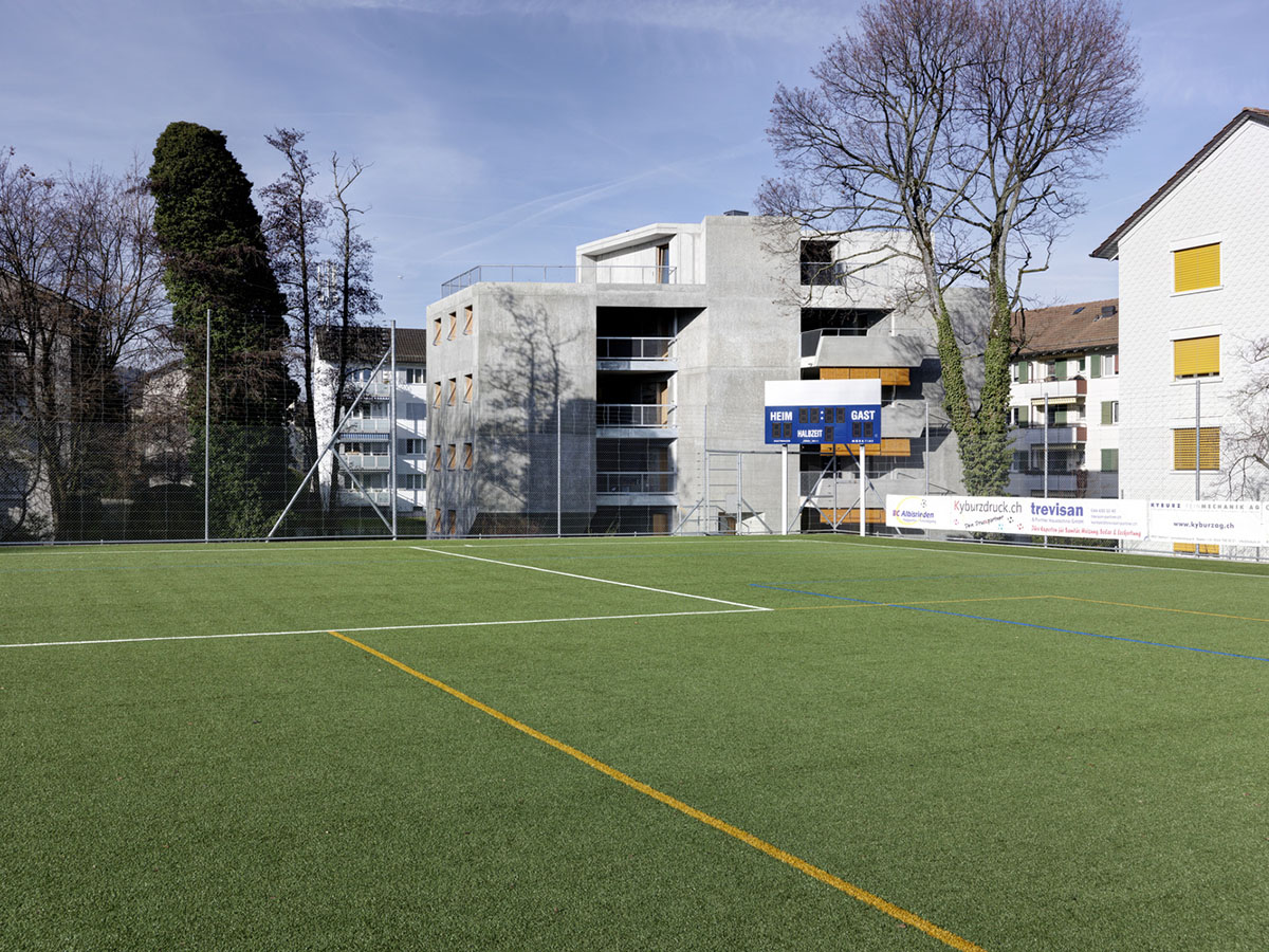 Gus Wüstemann Architects completes concrete affordable housing in Zurich