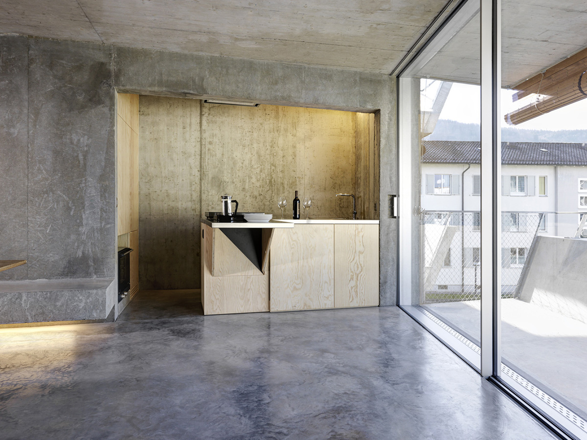 Gus Wüstemann Architects completes concrete affordable housing in Zurich