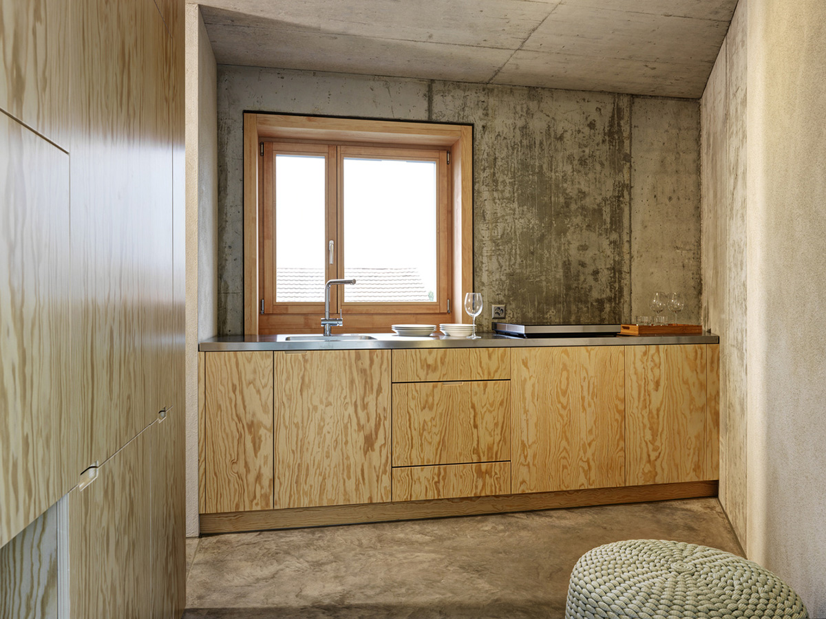 Gus Wüstemann Architects completes concrete affordable housing in Zurich