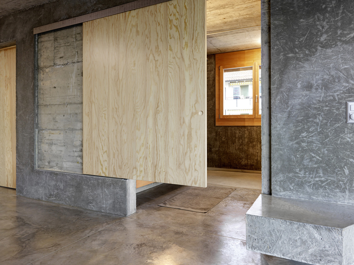 Gus Wüstemann Architects completes concrete affordable housing in Zurich