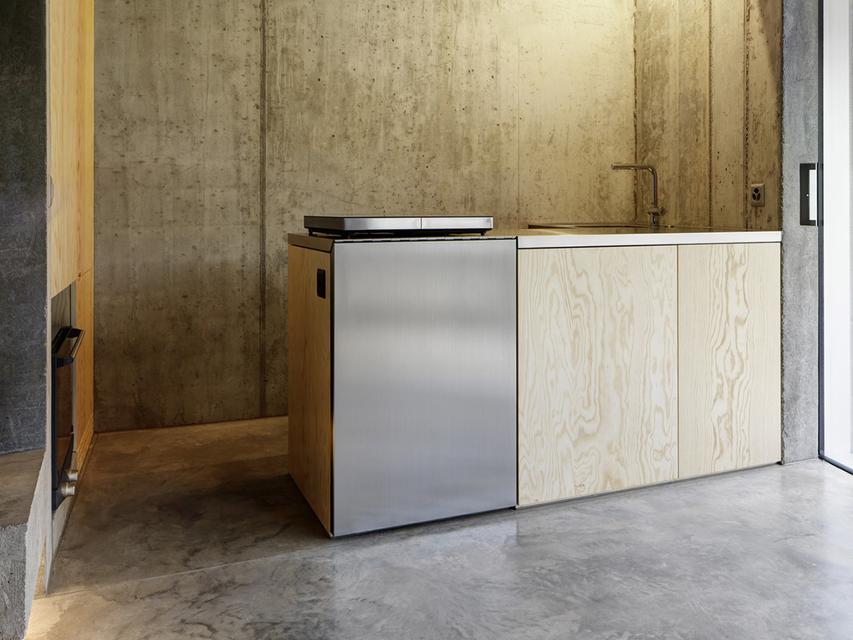 Gus Wüstemann Architects completes concrete affordable housing in Zurich