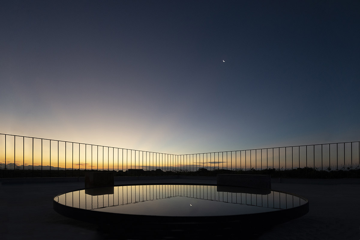 Concrete columns and beams wrap Cosmos House designed by S-AR in Mexico