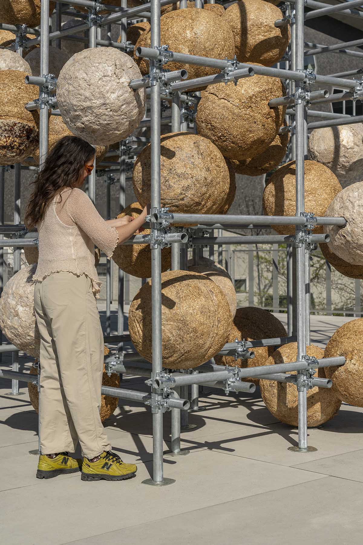 Henning Larsen unfolds the potential of mycelium with 80 spheres at Milan Design Week