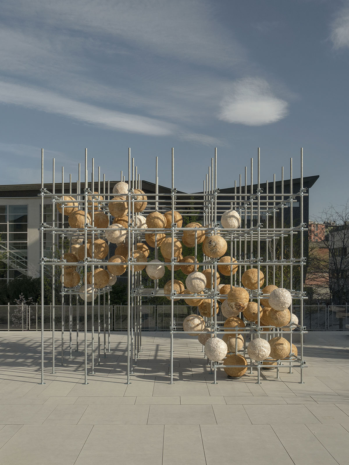 Henning Larsen unfolds the potential of mycelium with 80 spheres at Milan Design Week