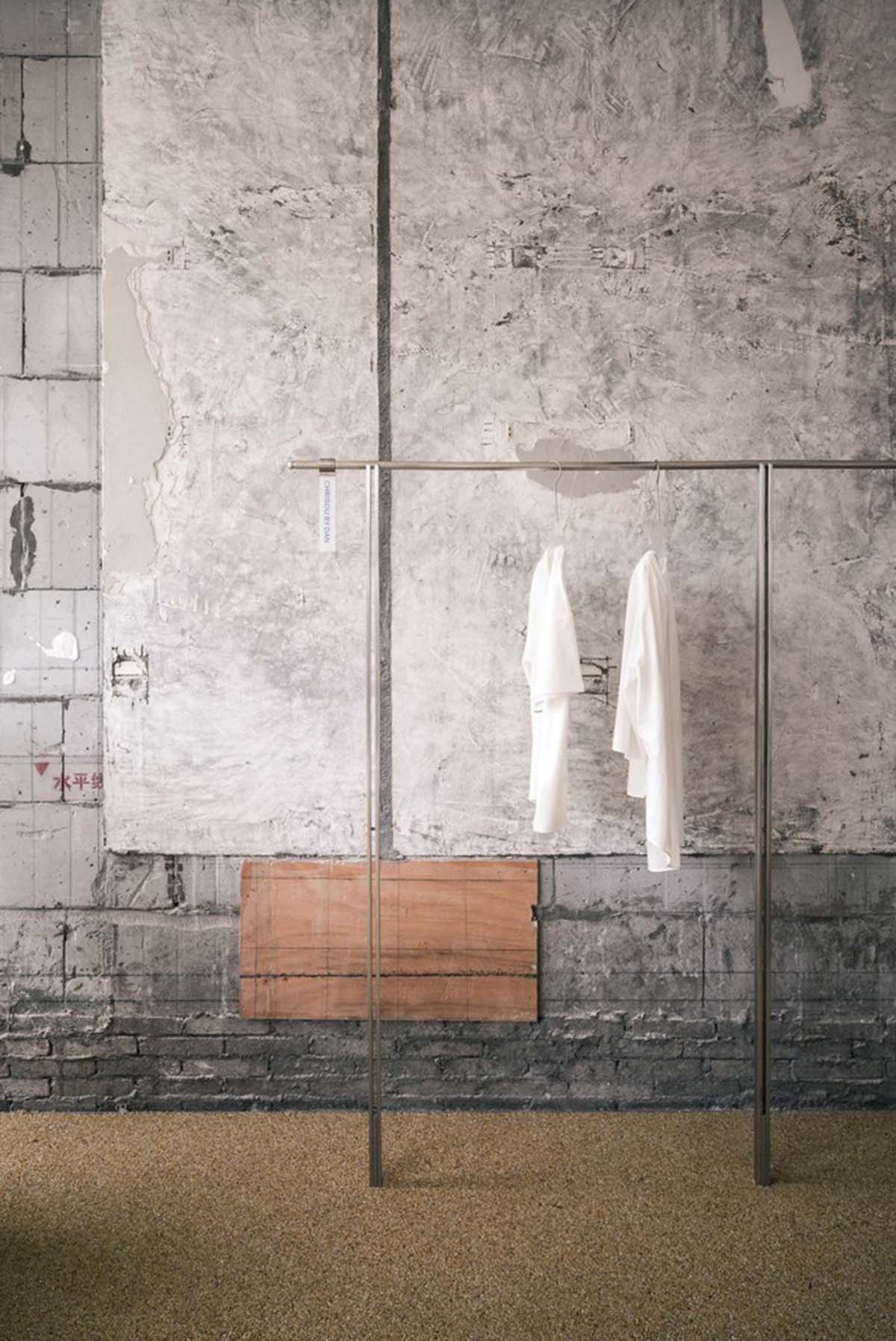 Cheese-like and stone tables with pinkish quirky-shaped elements add more personality to DSC store