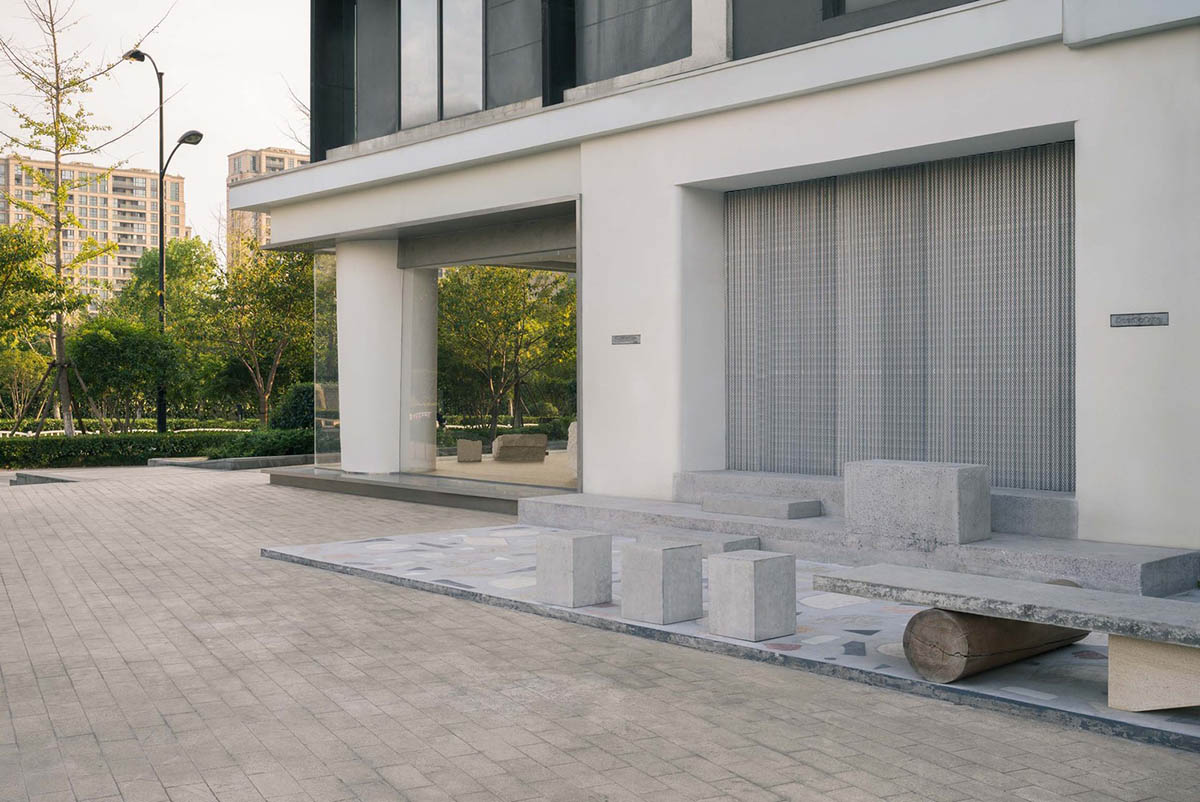 Cheese-like and stone tables with pinkish quirky-shaped elements add more personality to DSC store