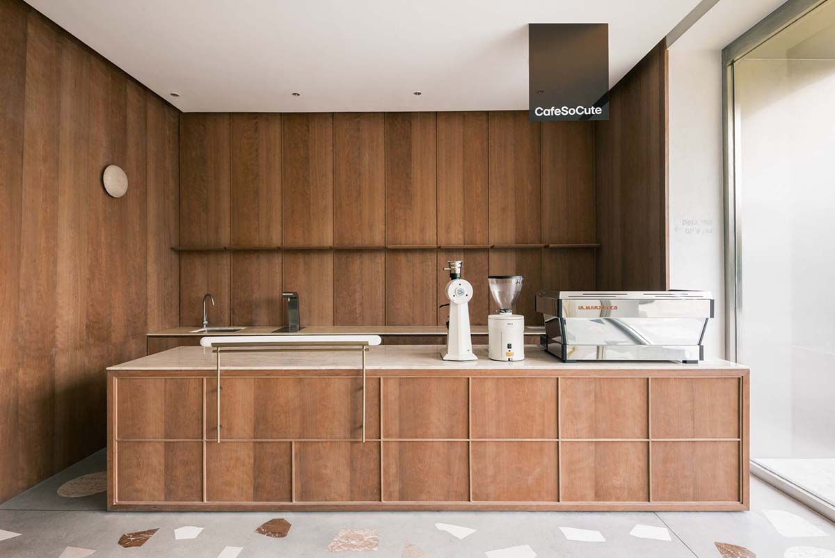 Cheese-like and stone tables with pinkish quirky-shaped elements add more personality to DSC store