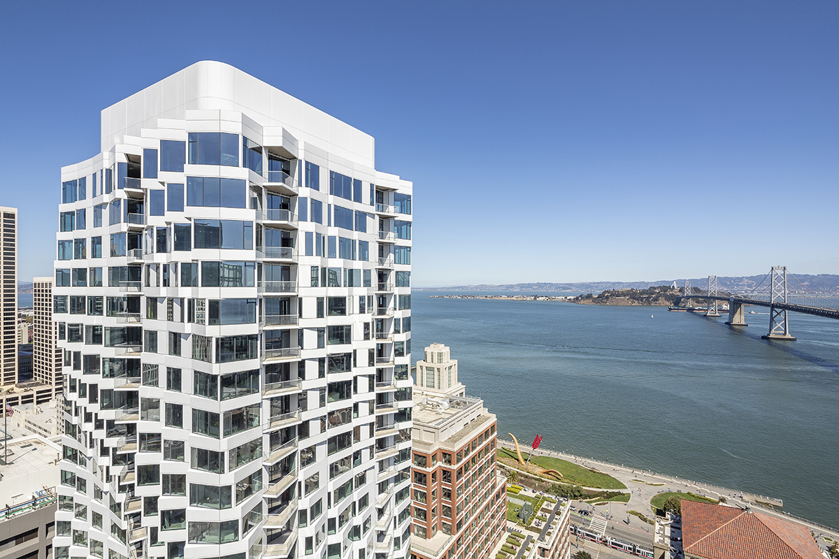 Studio Gang's twisting MIRA Tower gets white curtain wall as the building nearing completion