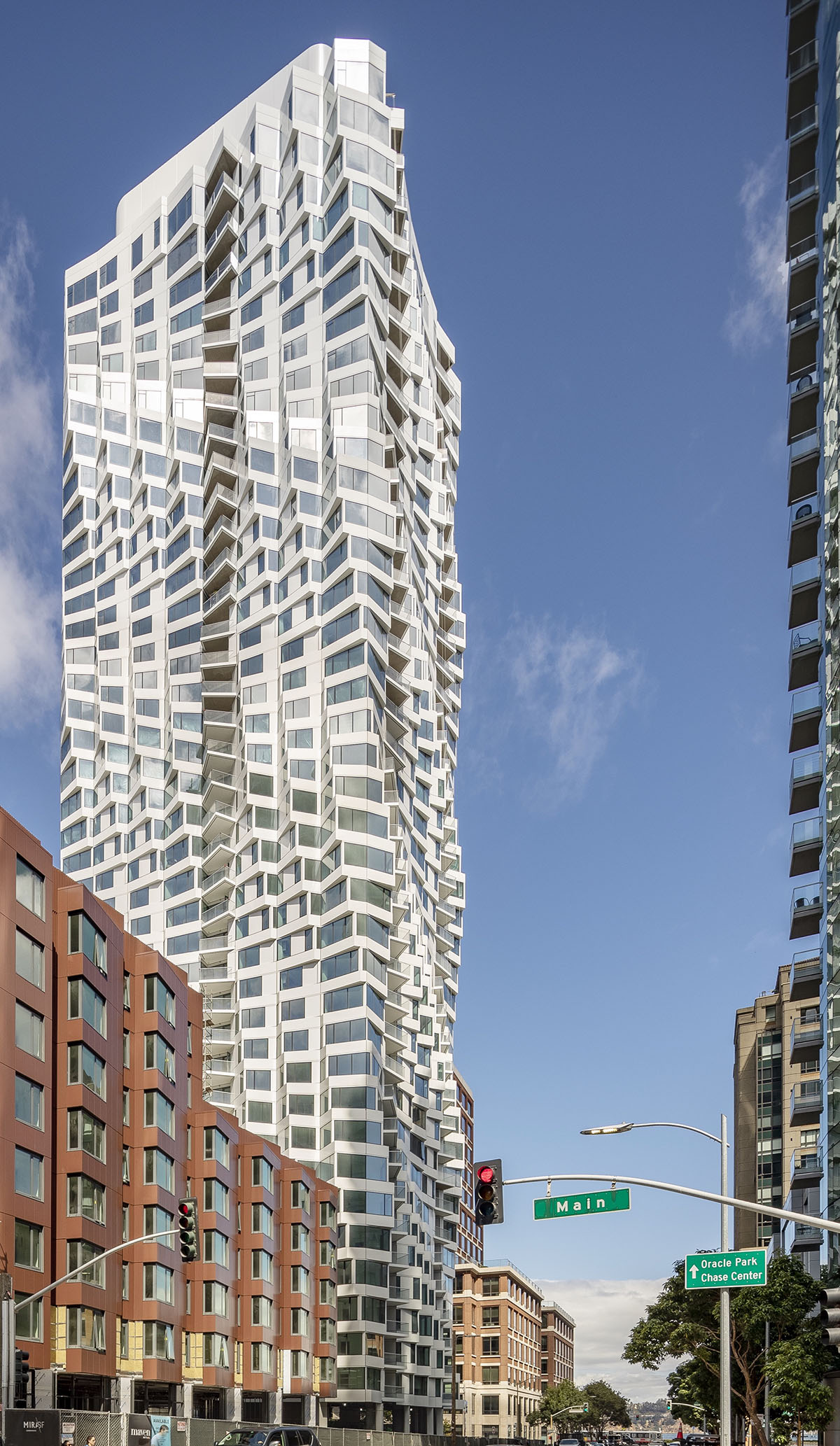 Studio Gang's twisting MIRA Tower gets white curtain wall as the building nearing completion