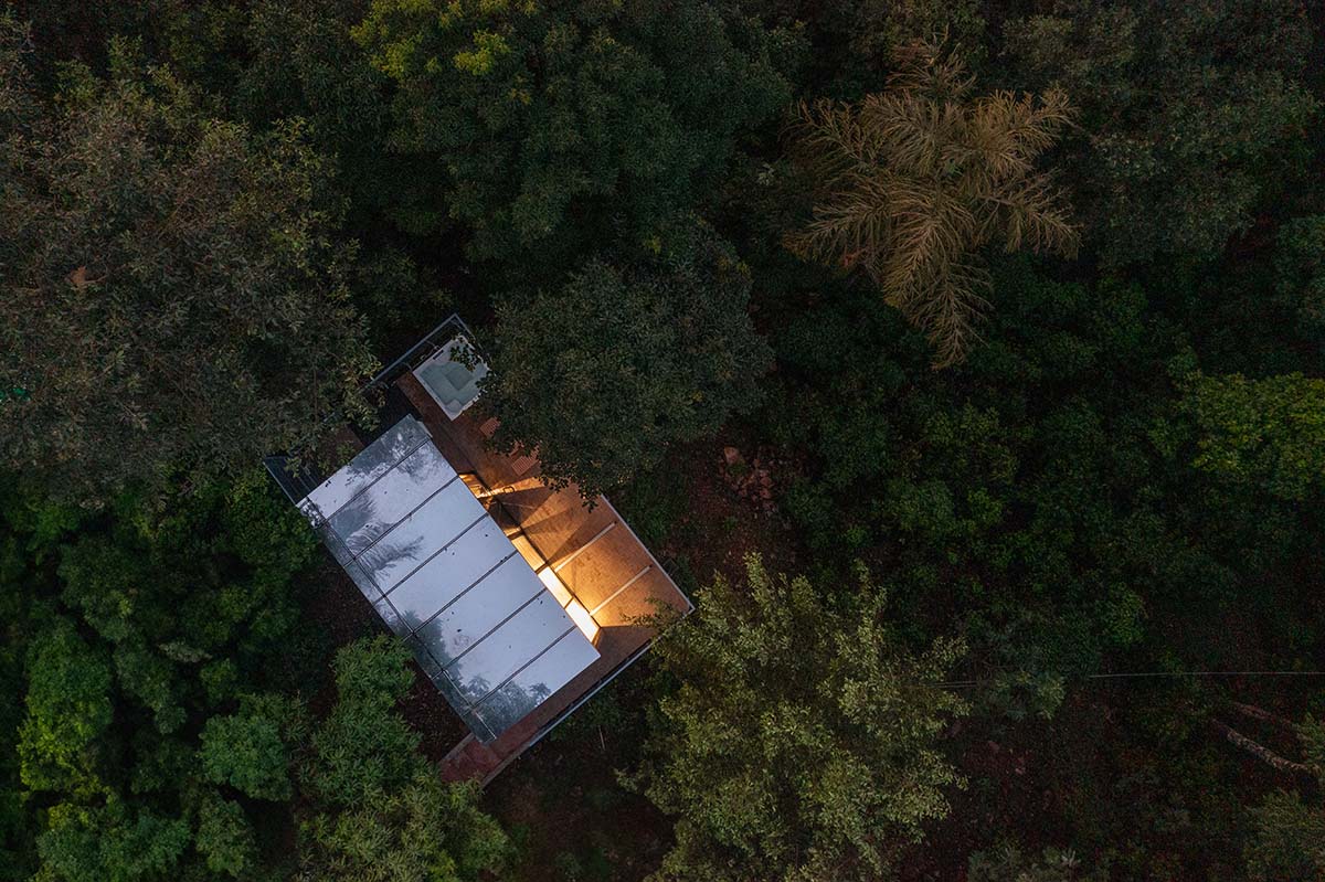Okno Modhomes completes a serene sanctuary with a mirrored façade in Karnataka