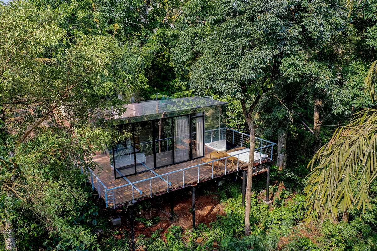Okno Modhomes completes a serene sanctuary with a mirrored façade in Karnataka