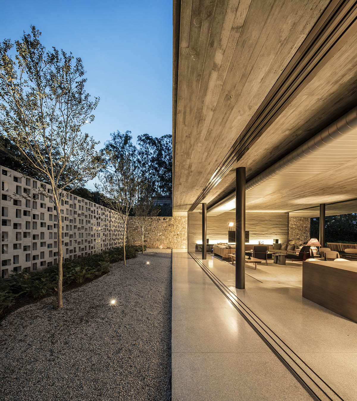 Studio MK27 Hides Elegantly Private Residence With Perforated Wall In A Poetic Landscape Of Brazil