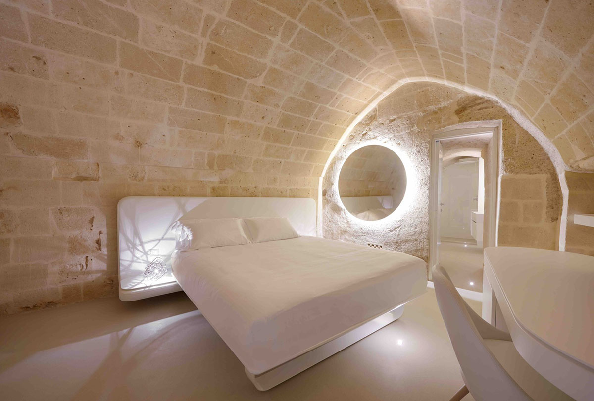 Interiors of this cave hotel and spa by Simone Micheli act like work of art with excavated surfaces