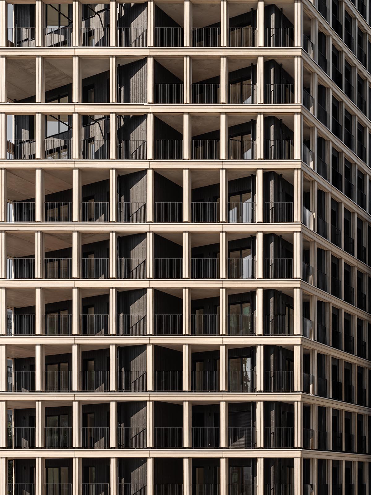 Moreau Kusunoki built residential timber tower with gridded facade in Paris 