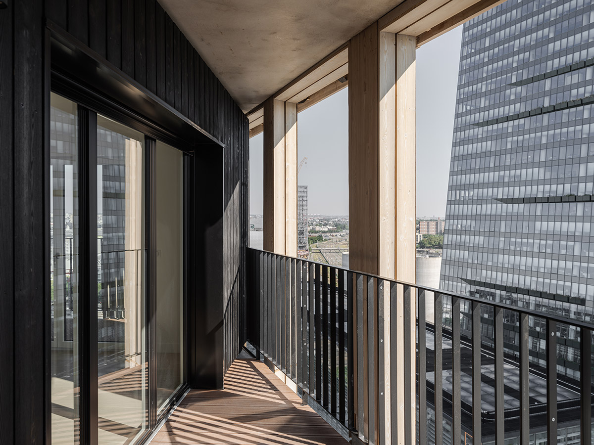 Moreau Kusunoki built residential timber tower with gridded facade in Paris 