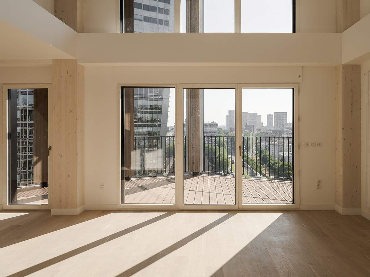 Moreau Kusunoki built residential timber tower with gridded facade in Paris 