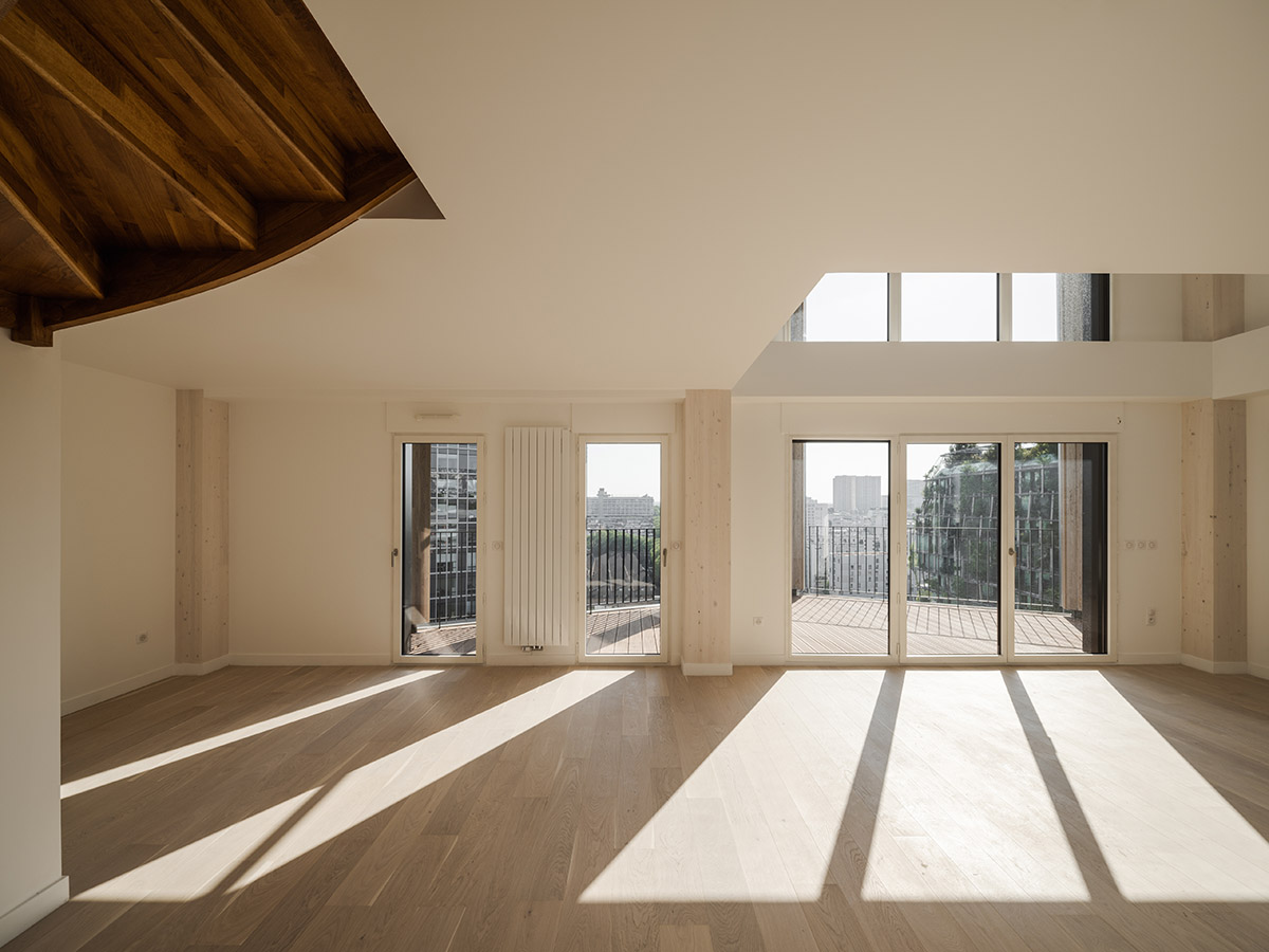 Moreau Kusunoki built residential timber tower with gridded facade in Paris 