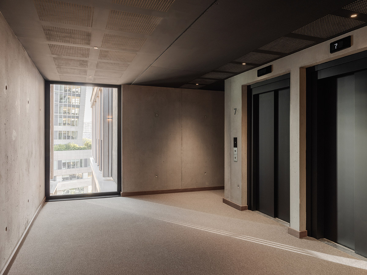 Moreau Kusunoki built residential timber tower with gridded facade in Paris 