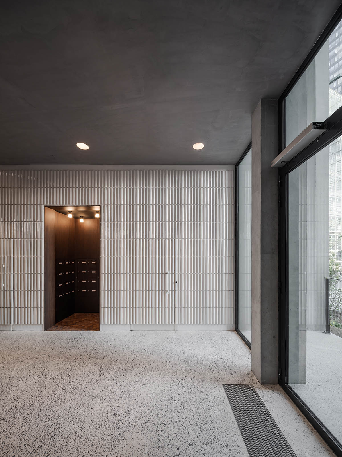 Moreau Kusunoki built residential timber tower with gridded facade in Paris 