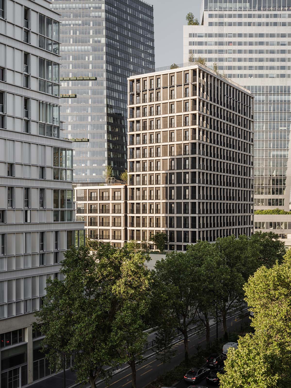 Moreau Kusunoki built residential timber tower with gridded facade in Paris 