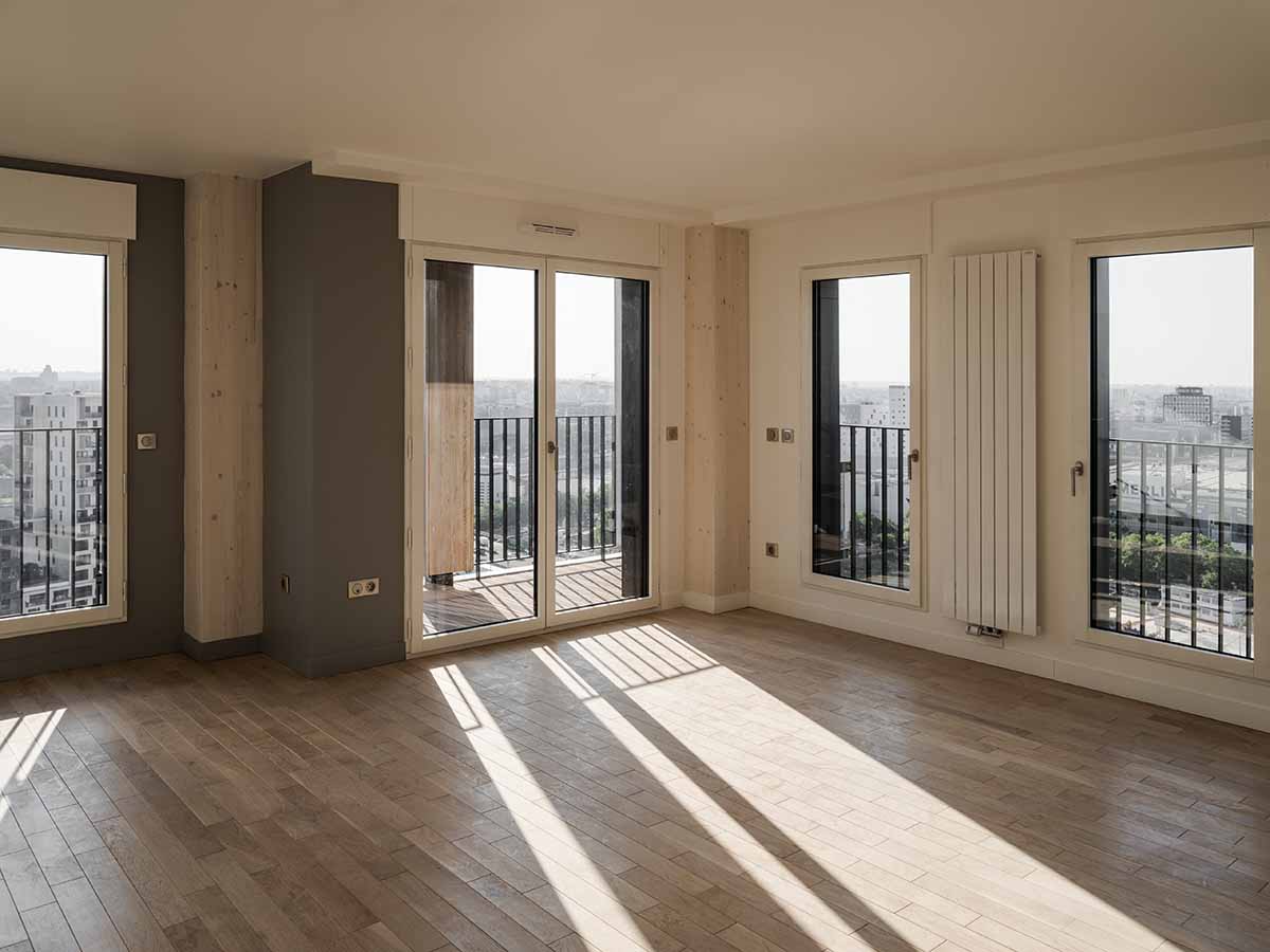 Moreau Kusunoki built residential timber tower with gridded facade in Paris 