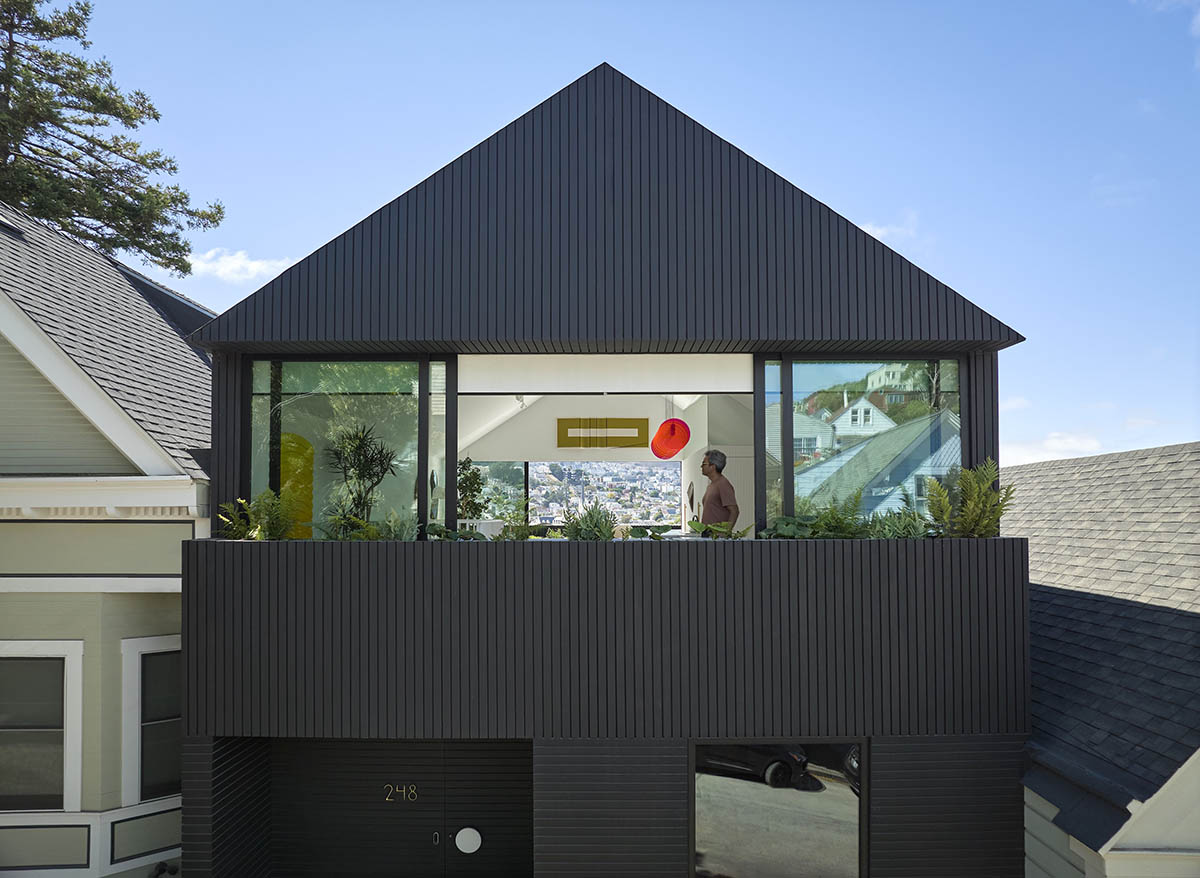 Black-clad house by Mork-Ulnes Architects serves as a container for art and experimentation in US 