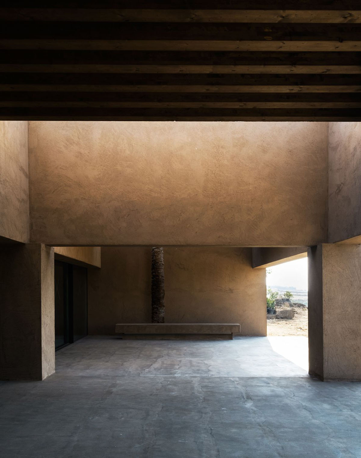 MORQ built Villa RA as the continuation of Calabria's rural landscape in Italy