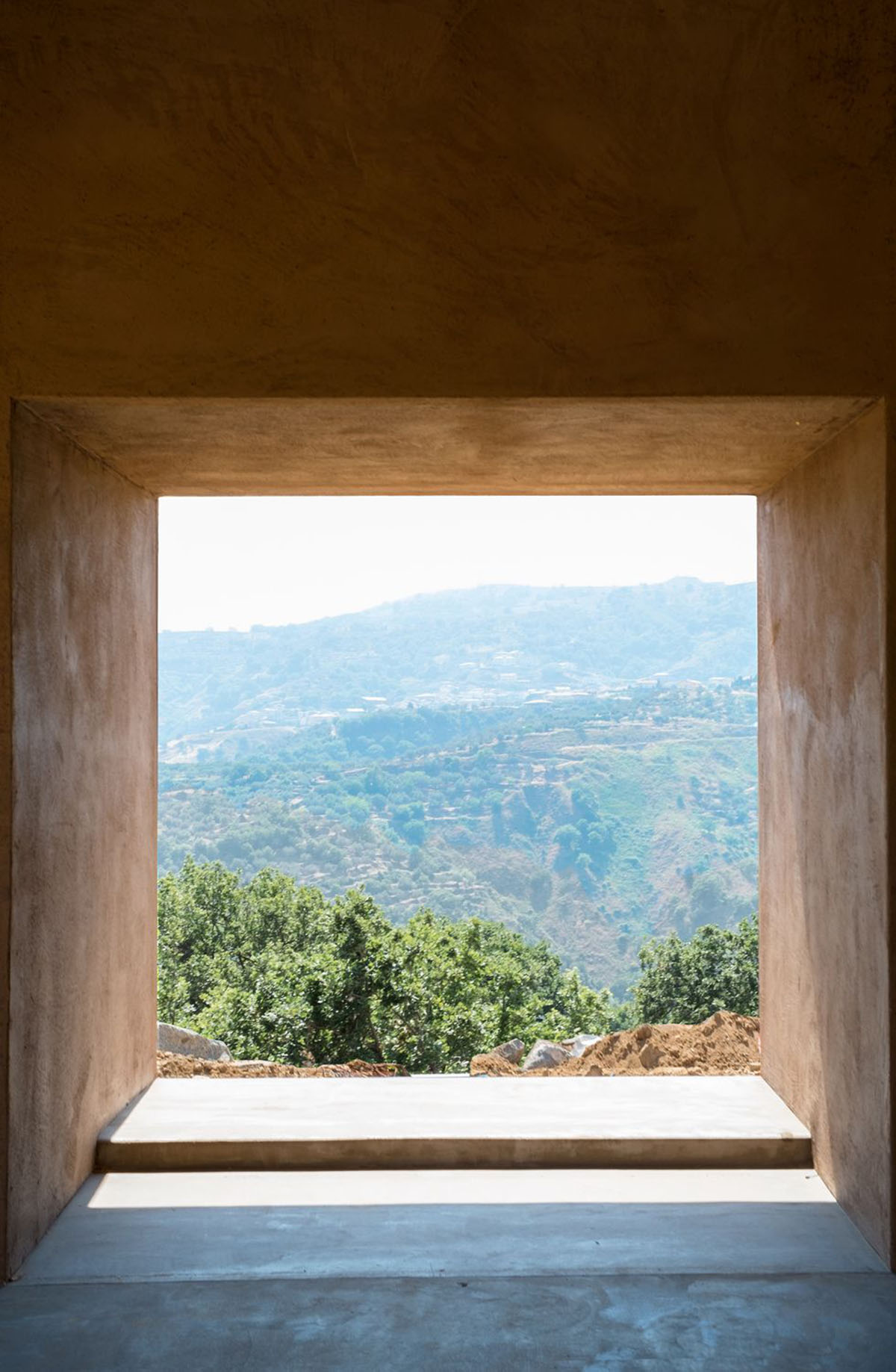 MORQ built Villa RA as the continuation of Calabria's rural landscape in Italy