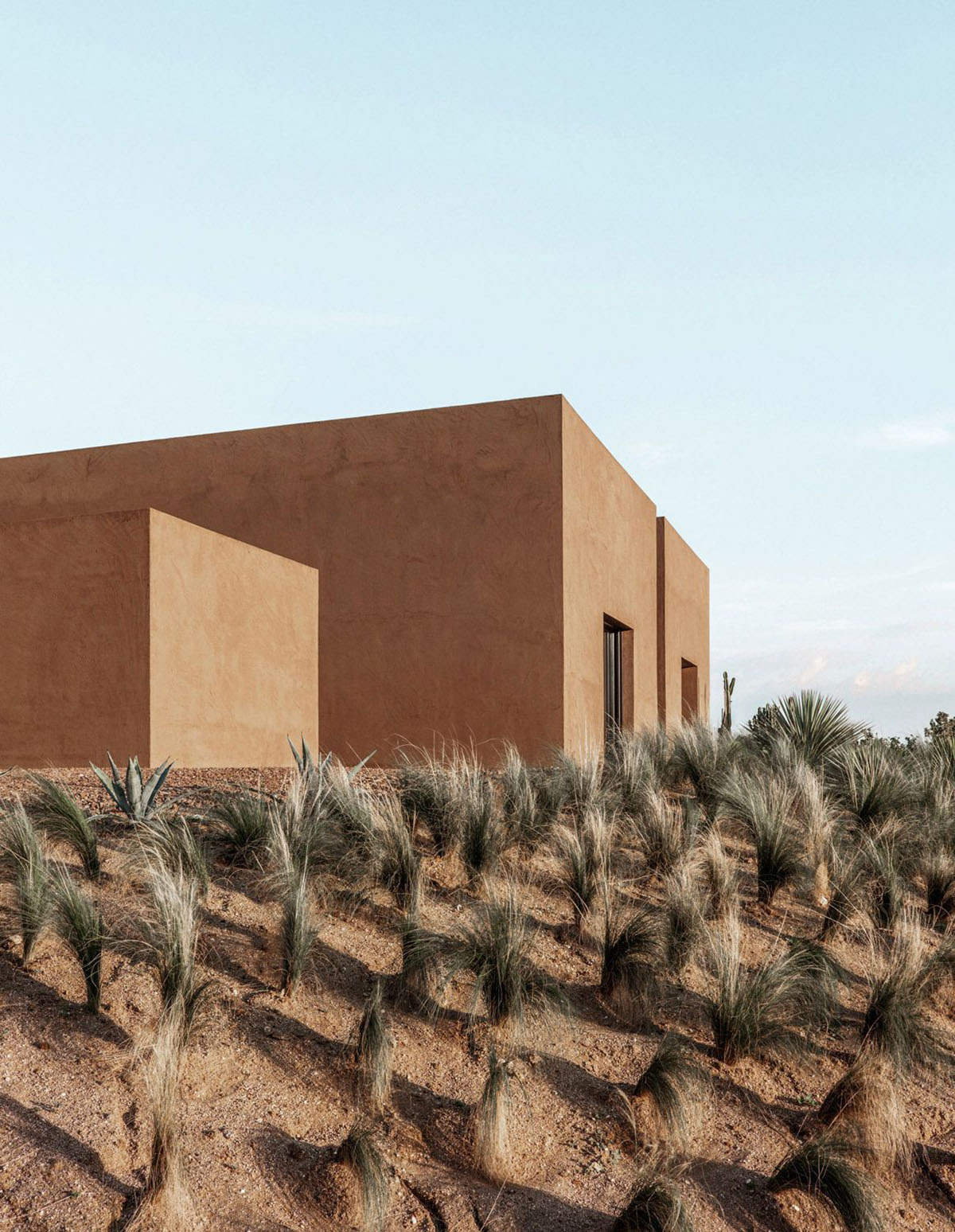 MORQ built Villa RA as the continuation of Calabria's rural landscape in Italy