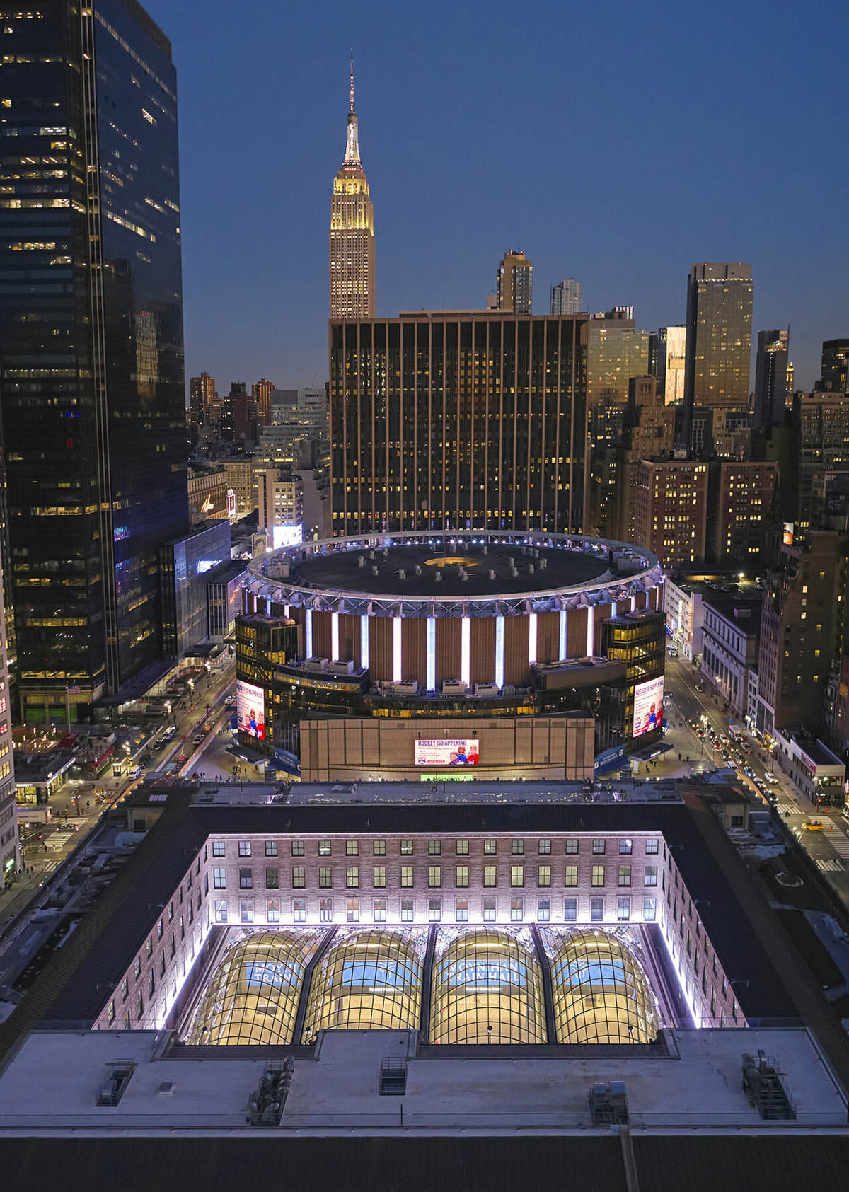 Designed by SOM, The Moynihan Train Hall expansion for NYC's Penn Station has opened its door