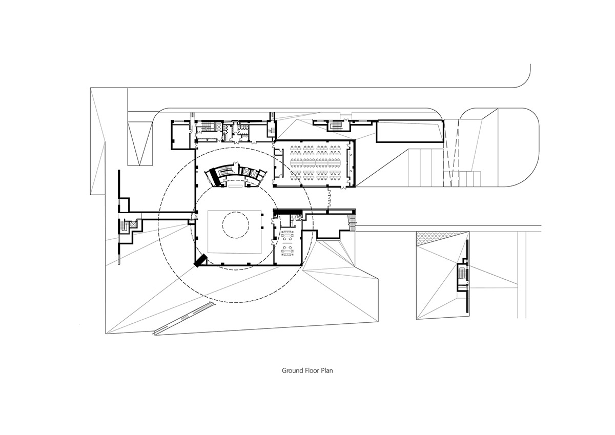 STUDIO A+ designs climbable ring-shaped art center on a green mound in Zhengzhou