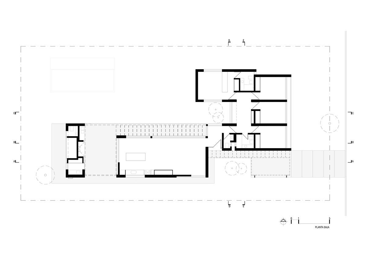 Nomade Architecture completes family house enveloped by white brick walls in Argentina