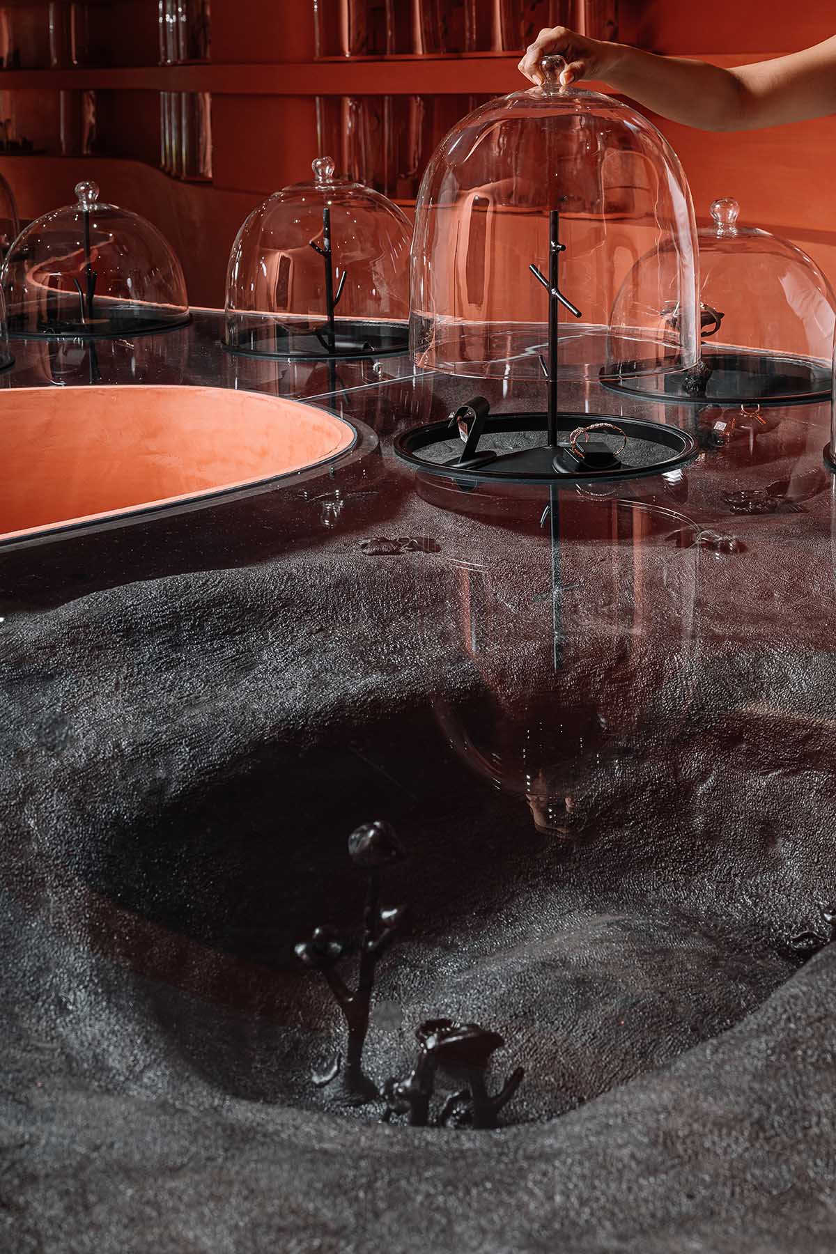 Indian jewellery boutique by MuseLAB features terracotta-doused interiors creating a sinuous island