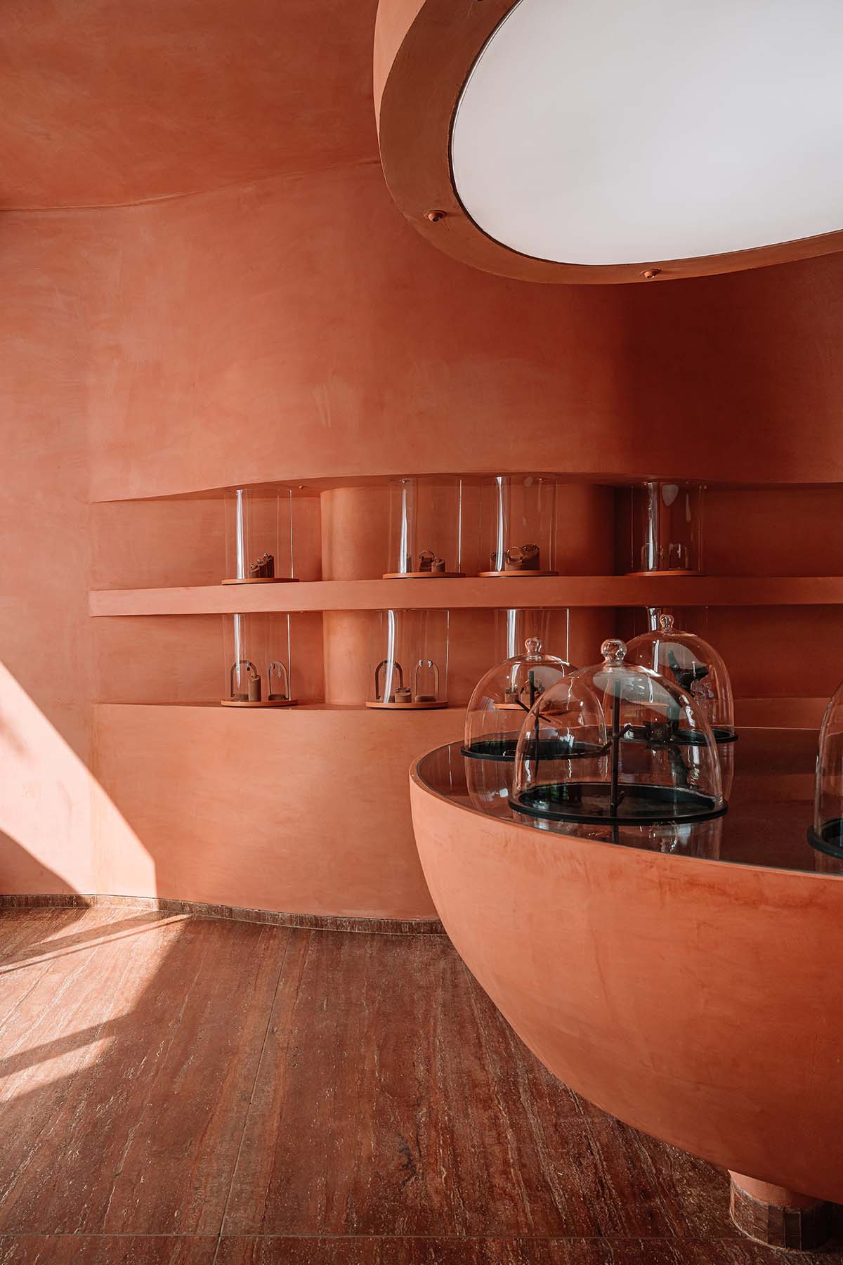 Indian jewellery boutique by MuseLAB features terracotta-doused interiors creating a sinuous island