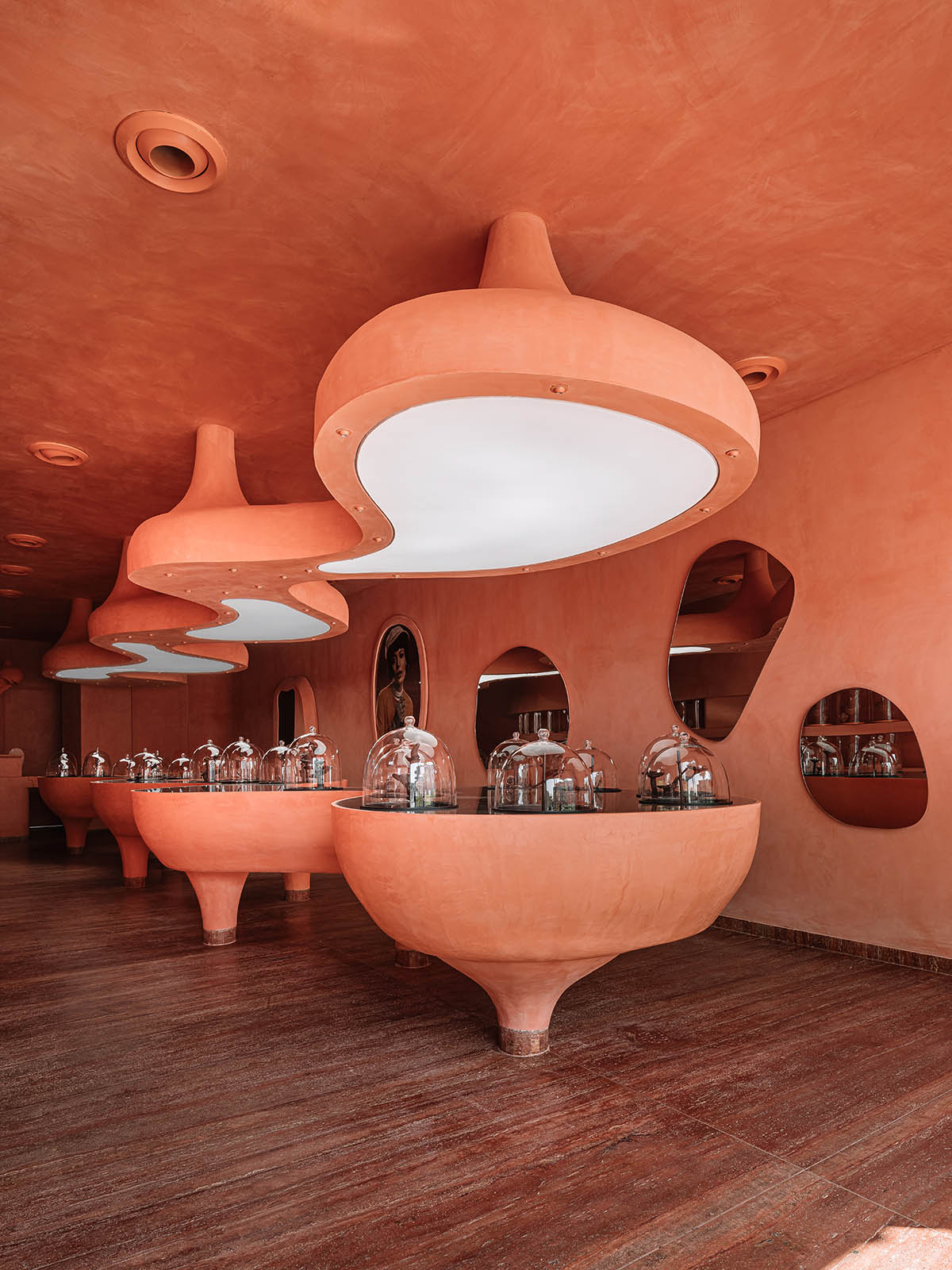 Indian jewellery boutique by MuseLAB features terracotta-doused interiors creating a sinuous island