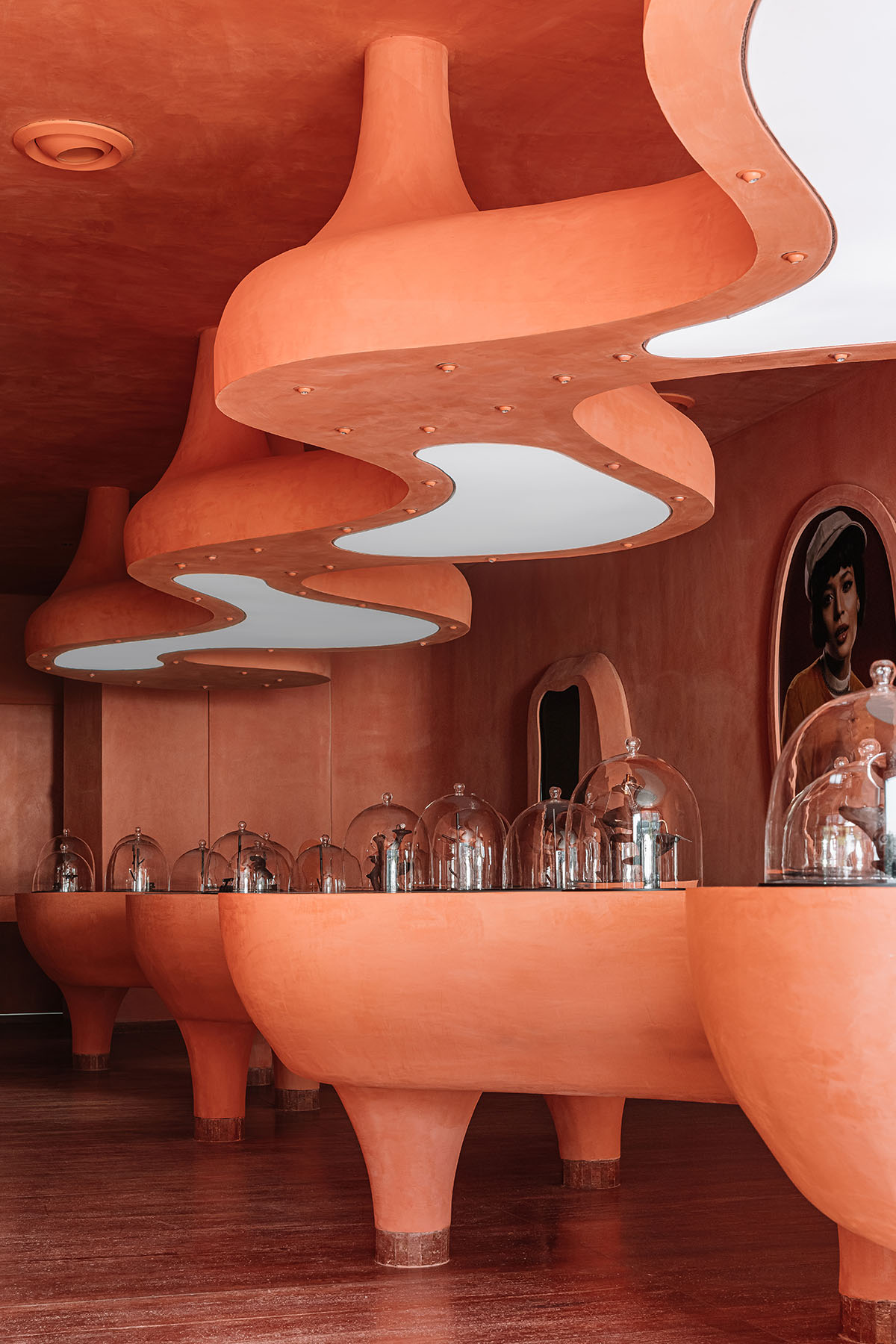 Indian jewellery boutique by MuseLAB features terracotta-doused interiors creating a sinuous island