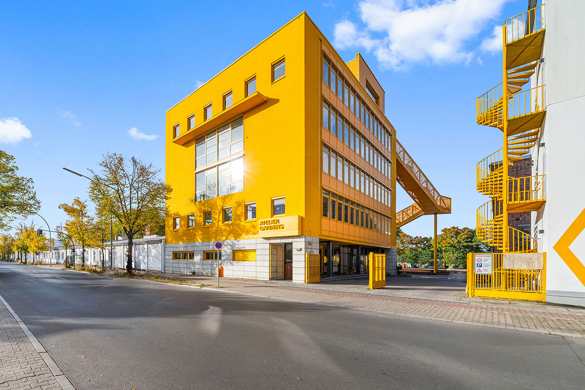 MVRDV revives old office building with bright yellow façade and ...