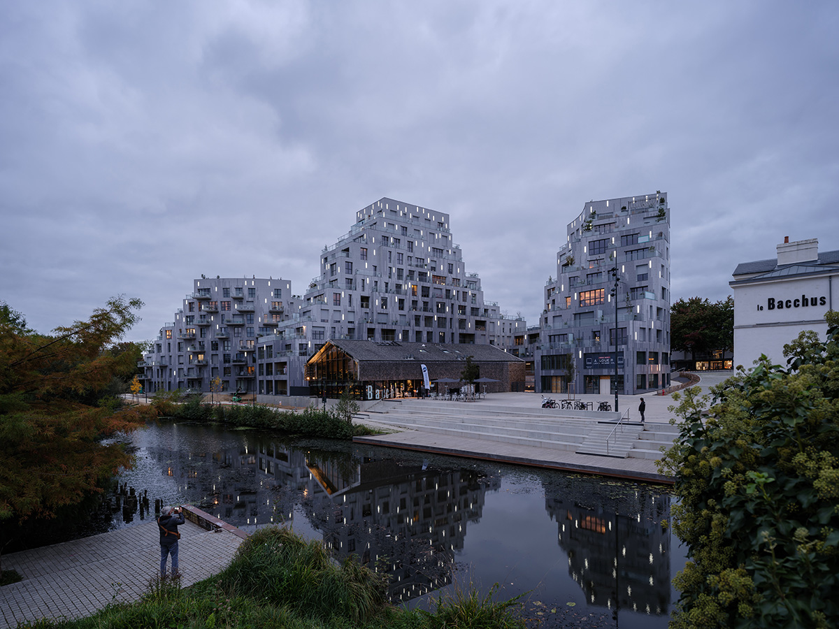 New residential complex by MVRDV is derived from geological formations in the riverside of Rennes