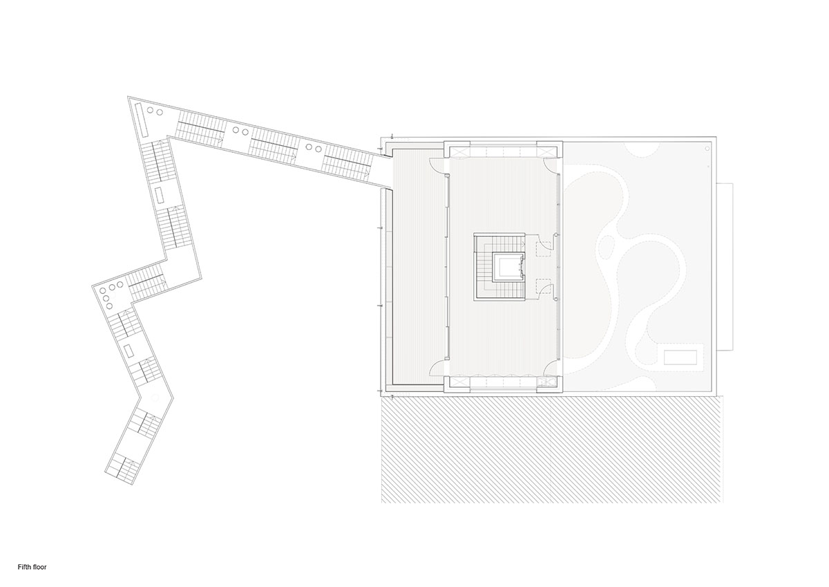 MVRDV revives old office building with bright yellow façade and zigzagging staircase in Berlin