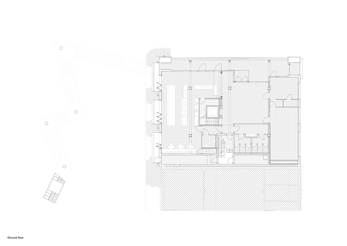 MVRDV revives old office building with bright yellow façade and zigzagging staircase in Berlin