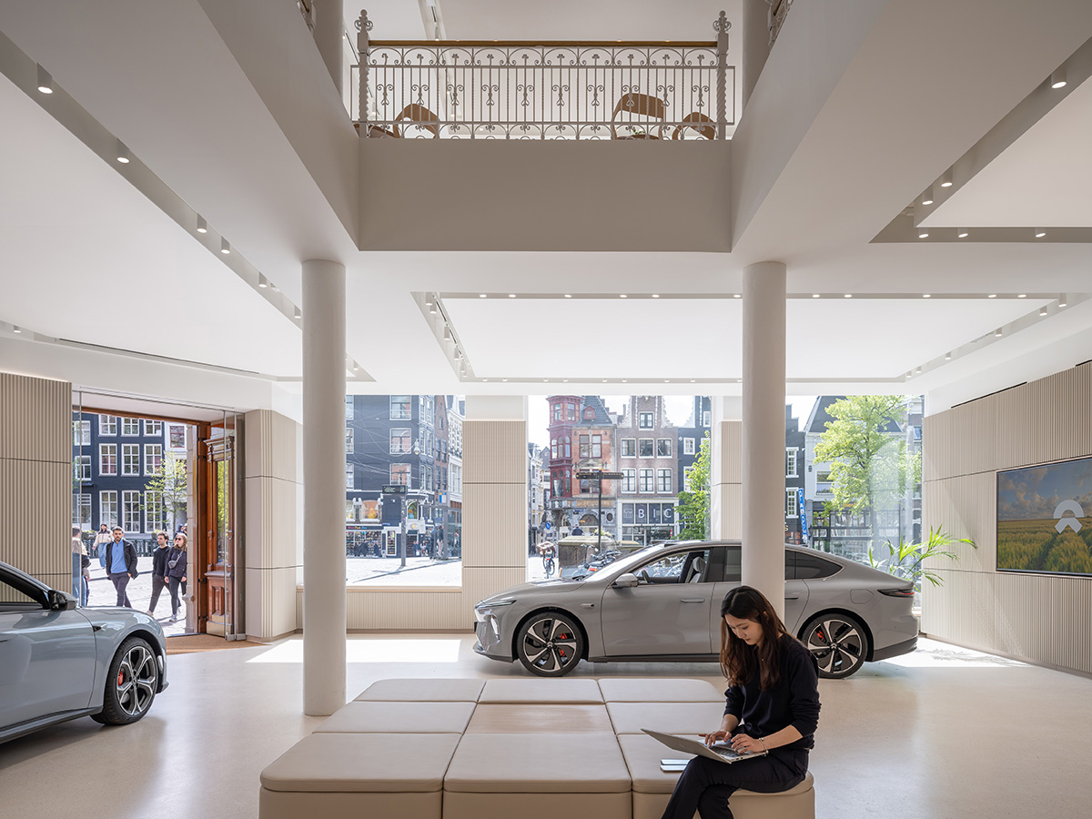MVRDV revives 19th-century building for electric car manufacturer company with rooftop pavilion