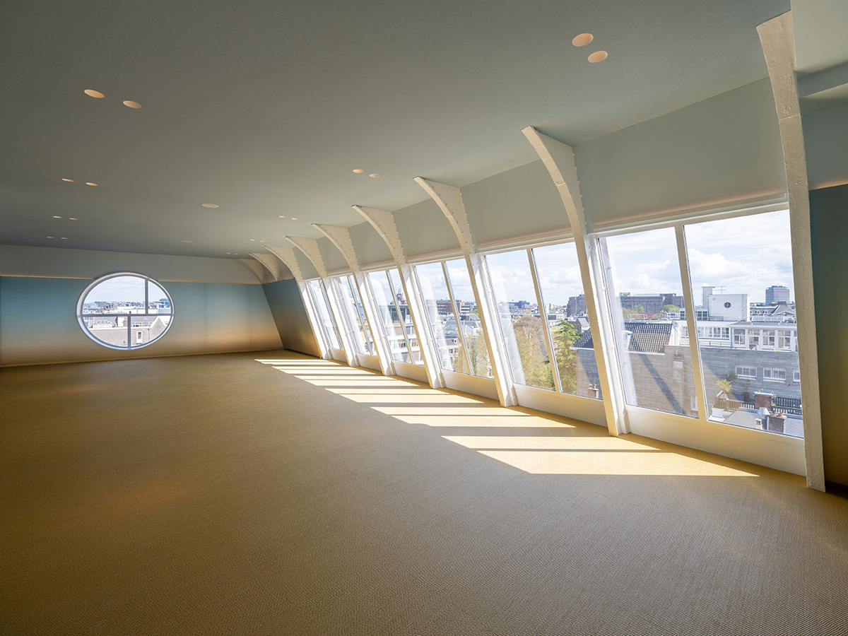 MVRDV revives 19th-century building for electric car manufacturer company with rooftop pavilion