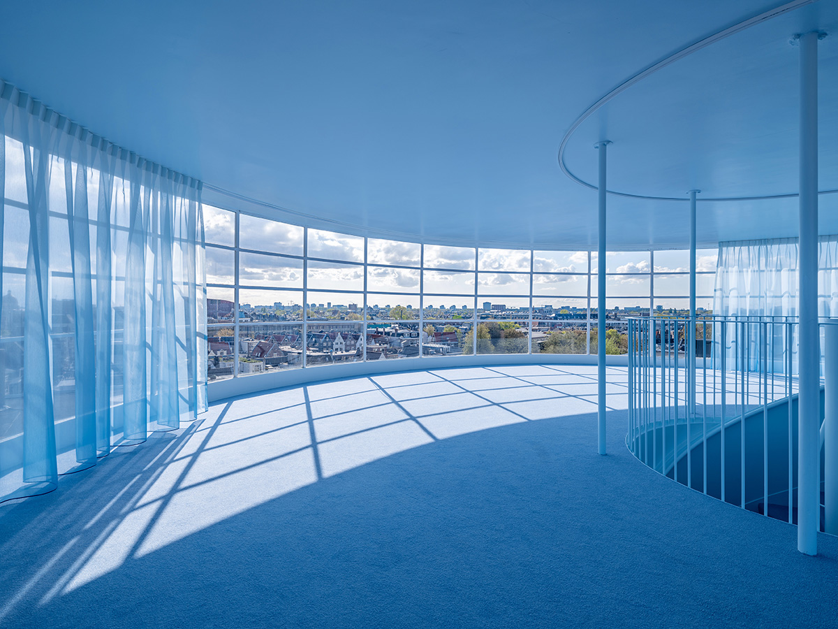 MVRDV revives 19th-century building for electric car manufacturer company with rooftop pavilion