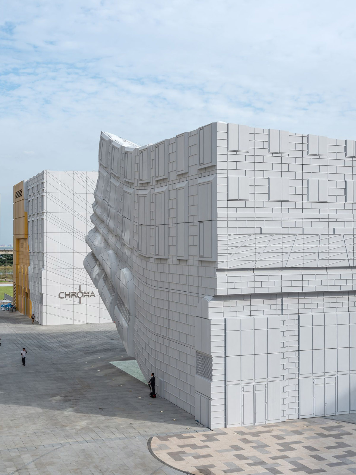 MVRDV completes entertainment complex featuring imprinted white and gold façade in Seoul