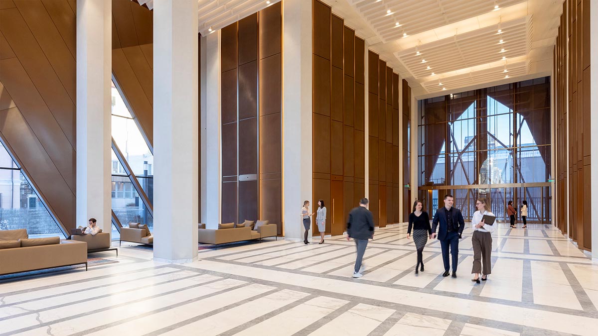 Foster + Partners completes office tower clad by triangular pieces of copper in Yekaterinburg