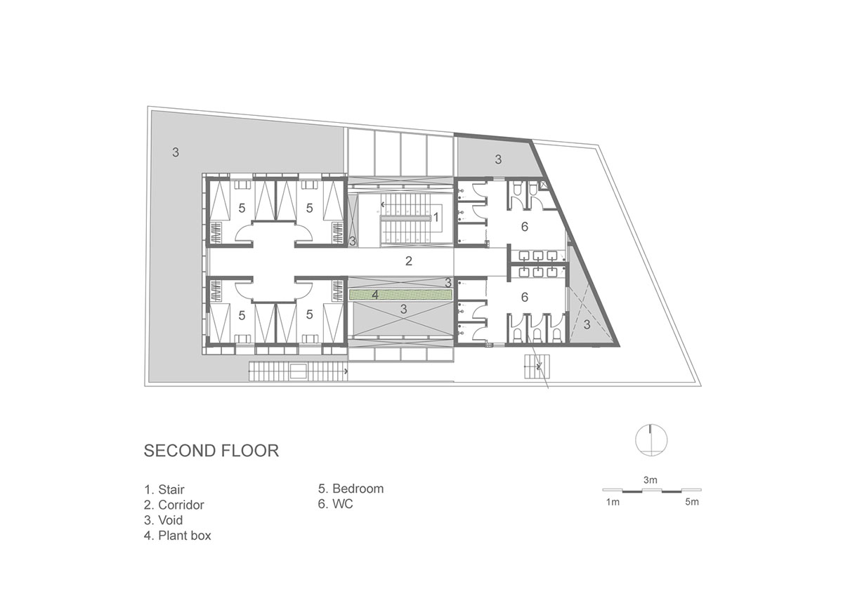 Le House wraps this small hotel with porous steel facade made of irregular patterns in Vietnam