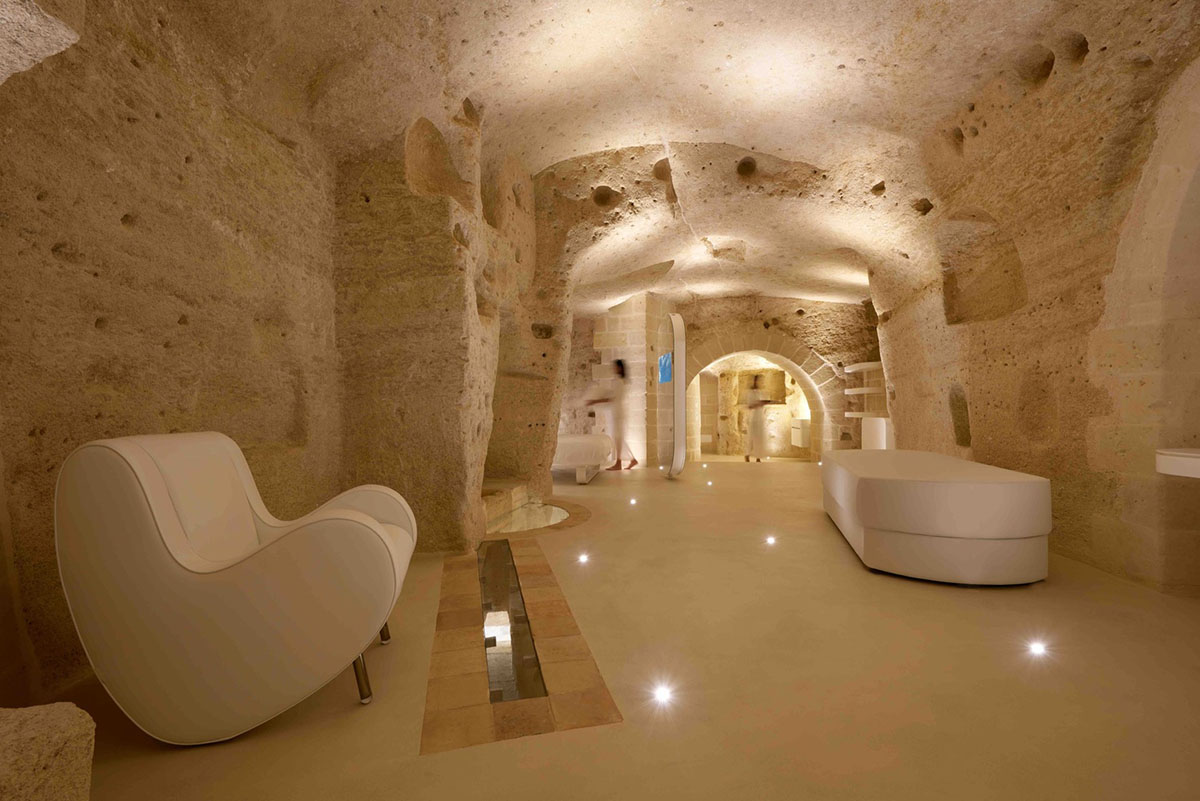 Interiors of this cave hotel and spa by Simone Micheli act like work of art with excavated surfaces