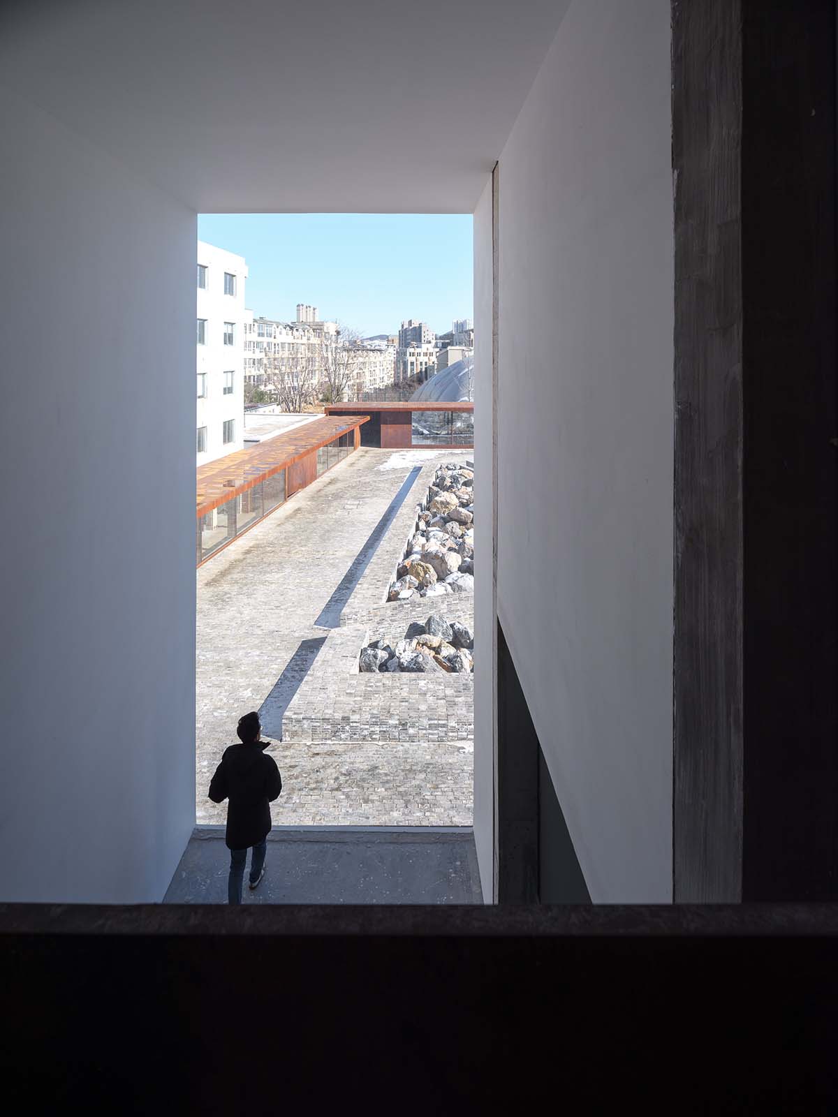 Neri&Hu revitalizes urban memory with corten steel volume in Dalian, China
